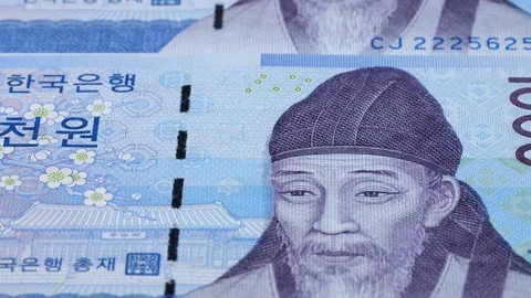 South Korea 1000 won notes slow tracking. Slider shot, low angle. 4K Stock Footage 126004038