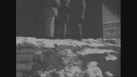 SOUTH KOREA - 1952: Checkpoint - Two soldiers guard an insignia signboard Stock Footage 344500620