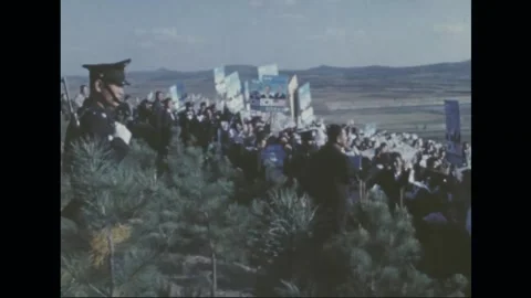 SOUTH KOREA - 1966: State visit — Hillside crowd with white pennants Video stock 342590789