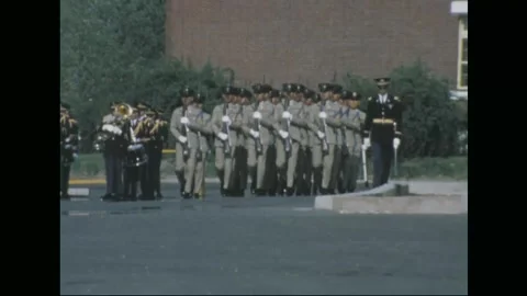 SOUTH KOREA - 1970: Eighth Army parade - tan-uniformed troops march in step Stock Footage 343936166
