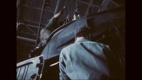 SOUTH KOREA - 1977: Component maintenance - Aircraft assembly under hoist 库存影片 343940249