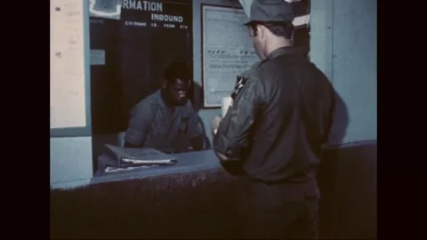 SOUTH KOREA - 1977: Flight dispatch - Dispatcher at information counter Vídeo Stock 343940222
