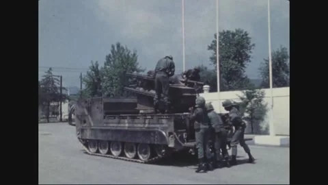 SOUTH KOREA - 1977: Missile loading - Round raised toward tracked launcher Stock Footage 343939595
