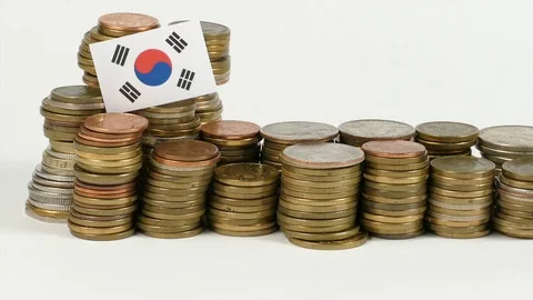South Korean flag waving with stack of money coins Stock Footage 71948149