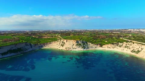South part of Malta island. Cliffs, rocks, sea and green fields. Drone view Stock Footage 329773810