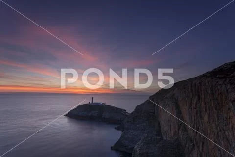 South Stack lighthouse at sunset, Anglesey, North Wales coast Stock Photos
