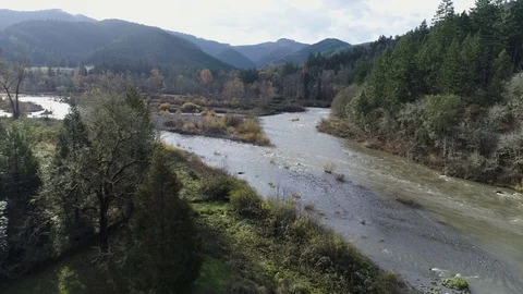South Umpqua River flyover on dynamic day Stock Footage 83837811