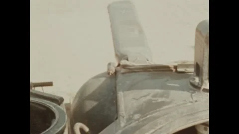 SOUTH VIETNAM - 1968: Base upkeep - Roadwheel detail and base compound Stock Footage 344483914