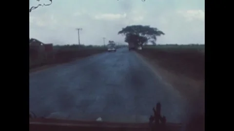 SOUTH VIETNAM - 1968: Document check - Road journey reaches a rural checkpoint Stock Footage 344484422