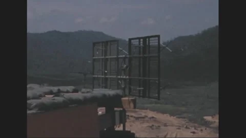 SOUTH VIETNAM - 1969: Antenna array - Mesh antenna reflectors above a parapet 库存影片 343941344