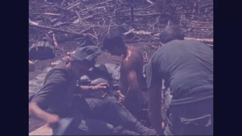 SOUTHEAST ASIA - 1970: Firebase Operations - Reaching into Stacked Boxes Stock Footage 343933449