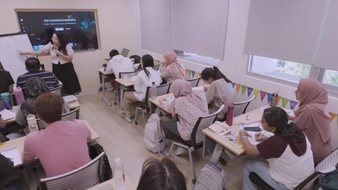Southeast Asian Students Learning Traditional Chinese in Taiwan Classroom Stock Footage 340470912