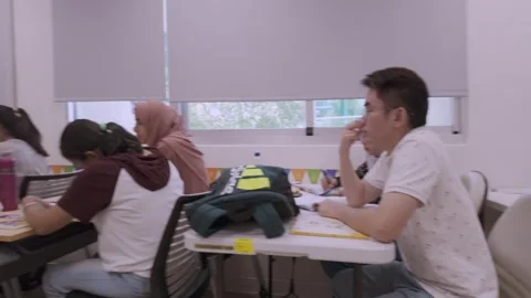 Southeast Asian Students Learning Traditional Chinese in Taiwan Classroom Stock Footage 340470921