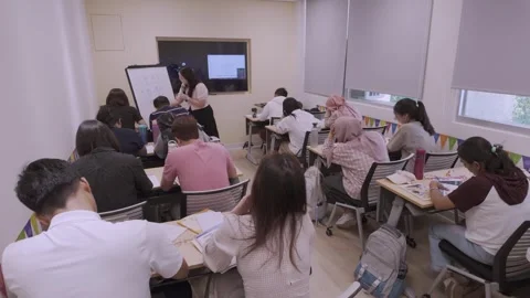 Southeast Asian Students Learning Traditional Chinese in Taiwan Classroom Stock Footage 340470930