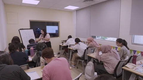 Southeast Asian Students Learning Traditional Chinese in Taiwan Classroom Stock Footage 340470951