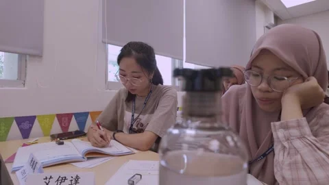 Southeast Asian Students Learning Traditional Chinese in Taiwan Classroom Stock Footage 340471005