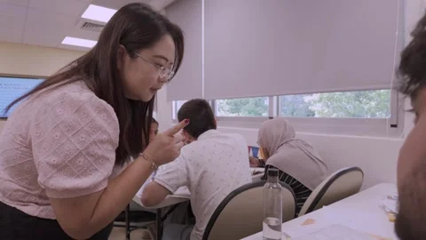 Southeast Asian Students Learning Traditional Chinese in Taiwan Classroom Stock Footage 340471060