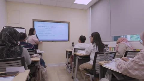 Southeast Asian Students Learning Traditional Chinese in Taiwan Classroom Stock Footage 340471332
