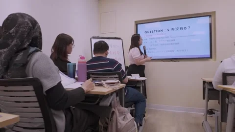 Southeast Asian Students Learning Traditional Chinese in Taiwan Classroom Stock Footage 340471339