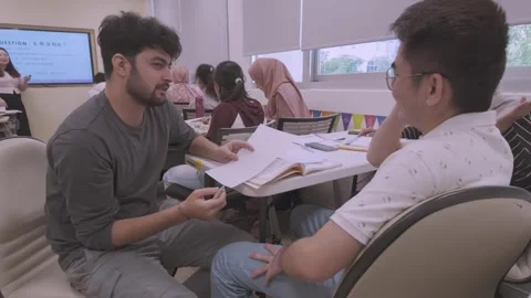 Southeast Asian Students Learning Traditional Chinese in Taiwan Classroom Stock Footage 340471575