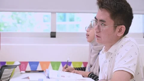 Southeast Asian Students Learning Traditional Chinese in Taiwan Classroom Stock Footage 340471820