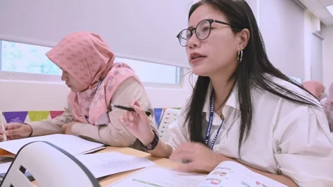Southeast Asian Students Learning Traditional Chinese in Taiwan Classroom Stock Footage 340471824