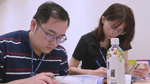 Southeast Asian Students Learning Traditional Chinese in Taiwan Classroom Stock Footage 340471840