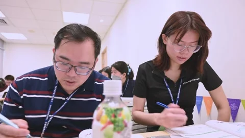 Southeast Asian Students Learning Traditional Chinese in Taiwan Classroom Stock Footage 340471845