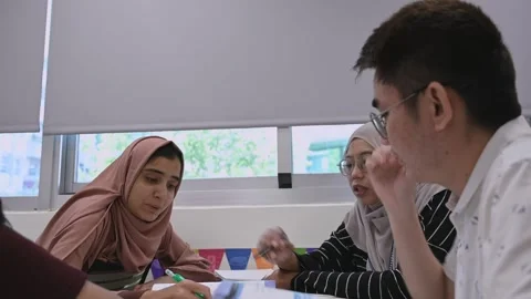 Southeast Asian Students Learning Traditional Chinese in Taiwan Classroom Stock Footage 340471925