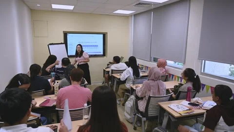 Southeast Asian Students Learning Traditional Chinese in Taiwan Classroom Stock Footage 340471993