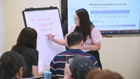 Southeast Asian Students Learning Traditional Chinese in Taiwan Classroom Stock Footage 340472012