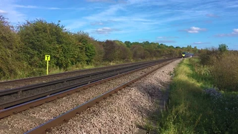 Southeastern high speed Javelin train traveling fast on track in Kent, England. Stock Footage 167138455