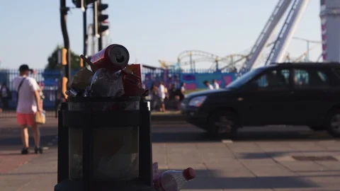 Southend, UK - Circa 2019: Full litter bin overflowing with rubbish on a 스톡 동영상 129344933