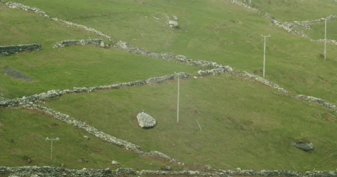Southern Irish Hillside Fields and Old Stone Walls Stock Footage 150435717