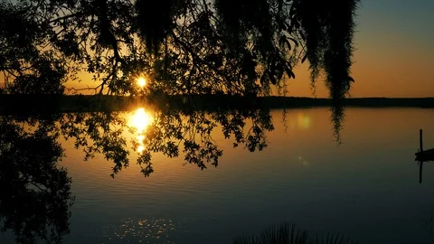 A Southern Riverfront Sunset Stock Footage 93019779