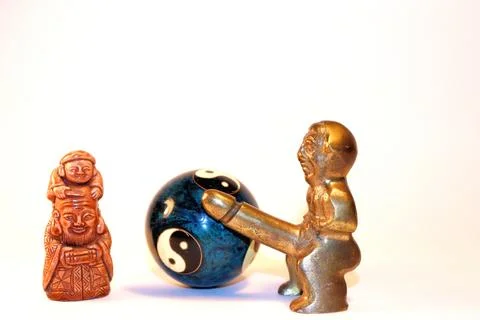 Souvenir Chinese netsuke stand on the table Stock Photos