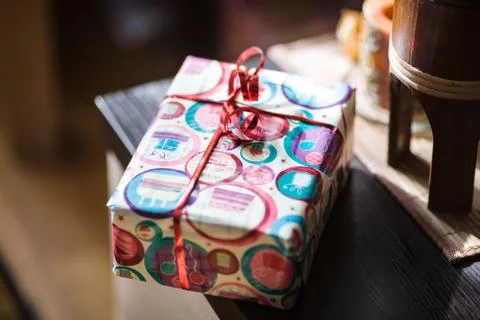 Souvenir left on the table in a gift box Stock Photos