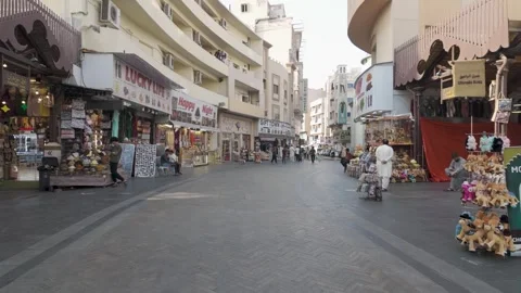 Souvenir Shops Line Old Souk Street in Dubai Stock Footage 342879954