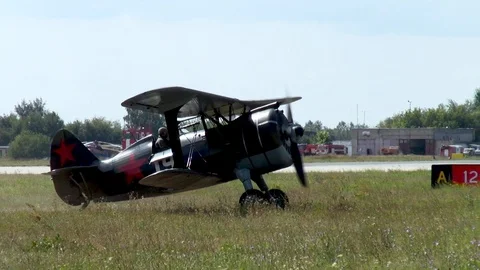 Soviet aircraft I-15 DIT, sent along airfield to taxiway. Close-up. Stock Footage 120497641