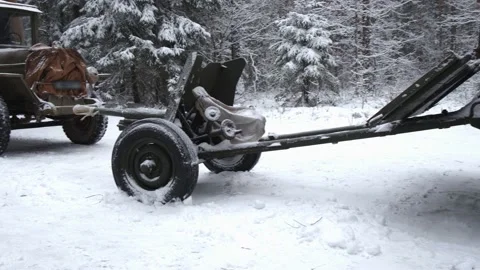 Soviet artillery cannon of the Second World War in the winter forest Stock Footage 220712767