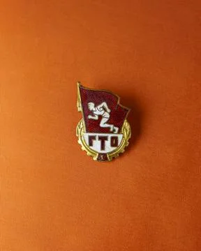 Soviet badge called ready for labor and defense of USSR on pioneer tie 스톡 사진