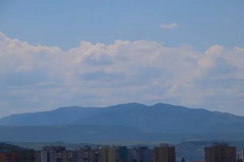 The soviet blocks and the mountains. Stock Photos
