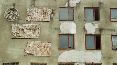 Soviet building exterior with murals Stock Footage 62910112