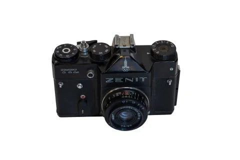 Soviet camera Zenith with Olympic symbols on a white background. Stock Photos