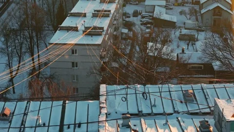 Soviet Era Housing Legacy in Snowy Agenskalns Riga Glowing at Cold Winter Sunset Stock Footage 346865296