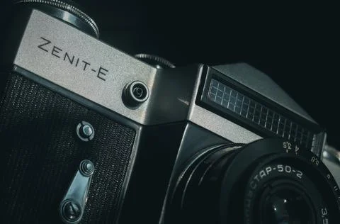 Soviet film camera Zenit-E with Industar 50-2 lens. Tilted composition, close-up Stock Photos