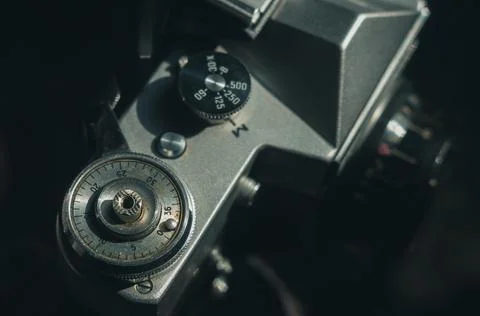 Soviet film camera Zenit-E with Industar 50-2 lens. Tilted composition, close-up Stock Photos