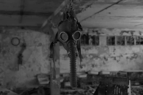 A soviet gas mask hangs from the ceiling at the Chernobyl Exclusion Zone Foto stock