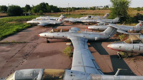 Soviet jet warplanes on ground at abandoned air base Stock Footage 160927184