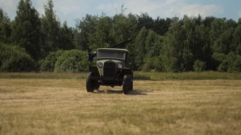 Soviet Katyusha multiple rocket launcher Vehicle drives across field in Great Видео 306367124